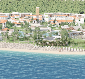 Luftaufnahme des Paloma Grida Resorts mit roten D&auml;chern, Poolanlagen und gepflegtem Sandstrand direkt am t&uuml;rkisblauen Meer.